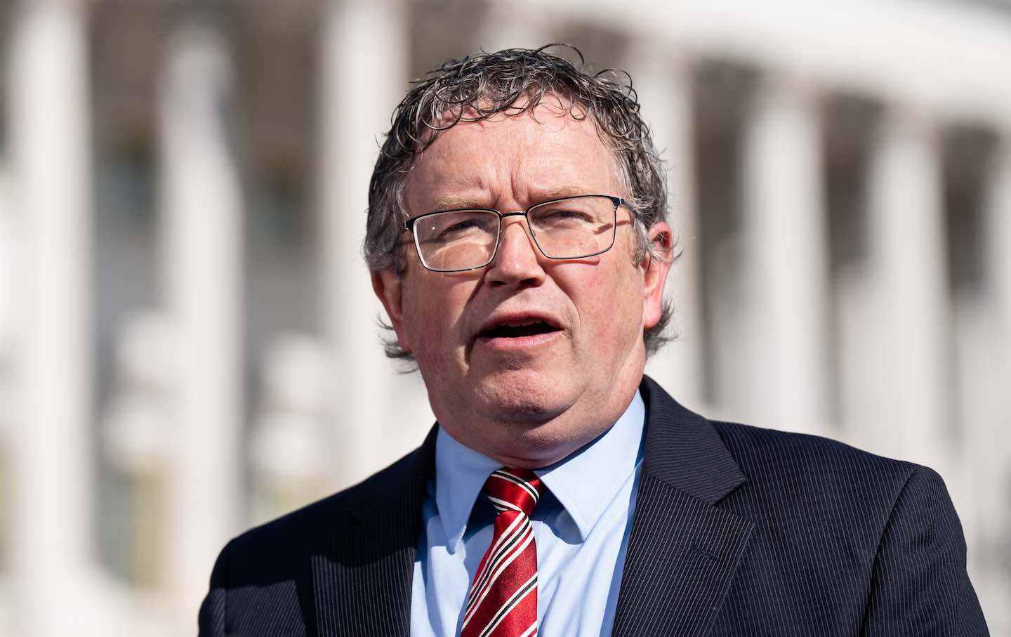 Representative Thomas Massie (R-KY) speaks during a news conference with Representative Marjorie Taylor Greene (R-GA) outside the US Capitol on May 1, announcing that they will move forward on the motion to vacate Speaker Mike Johnson.