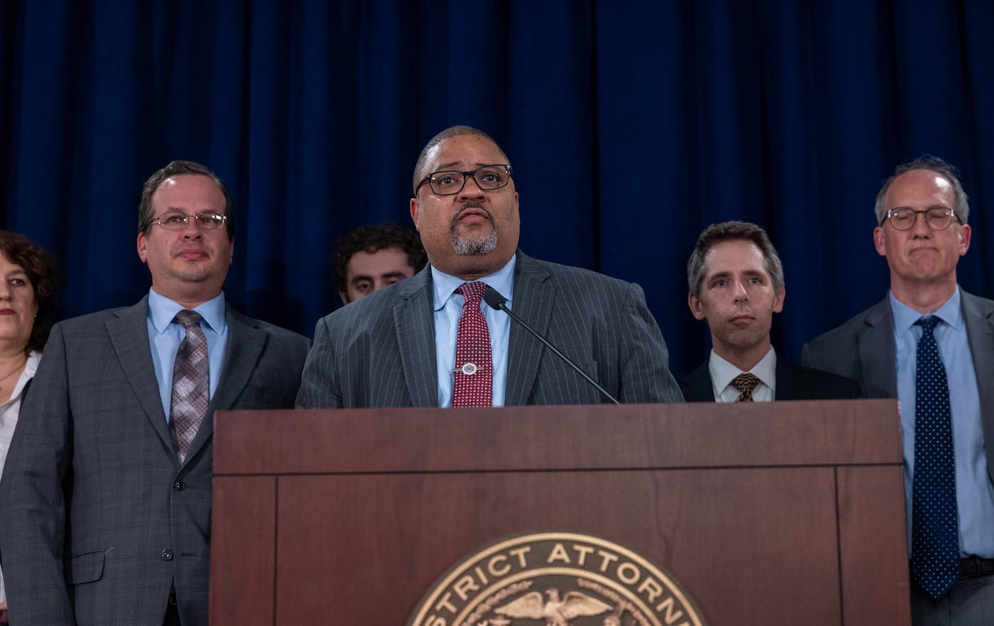 Manhattan District Attorney Alvin Bragg stands with members of his staff at a news conference following the conviction of former president Donald Trump in his hush-money trial on May 30 in New York City.