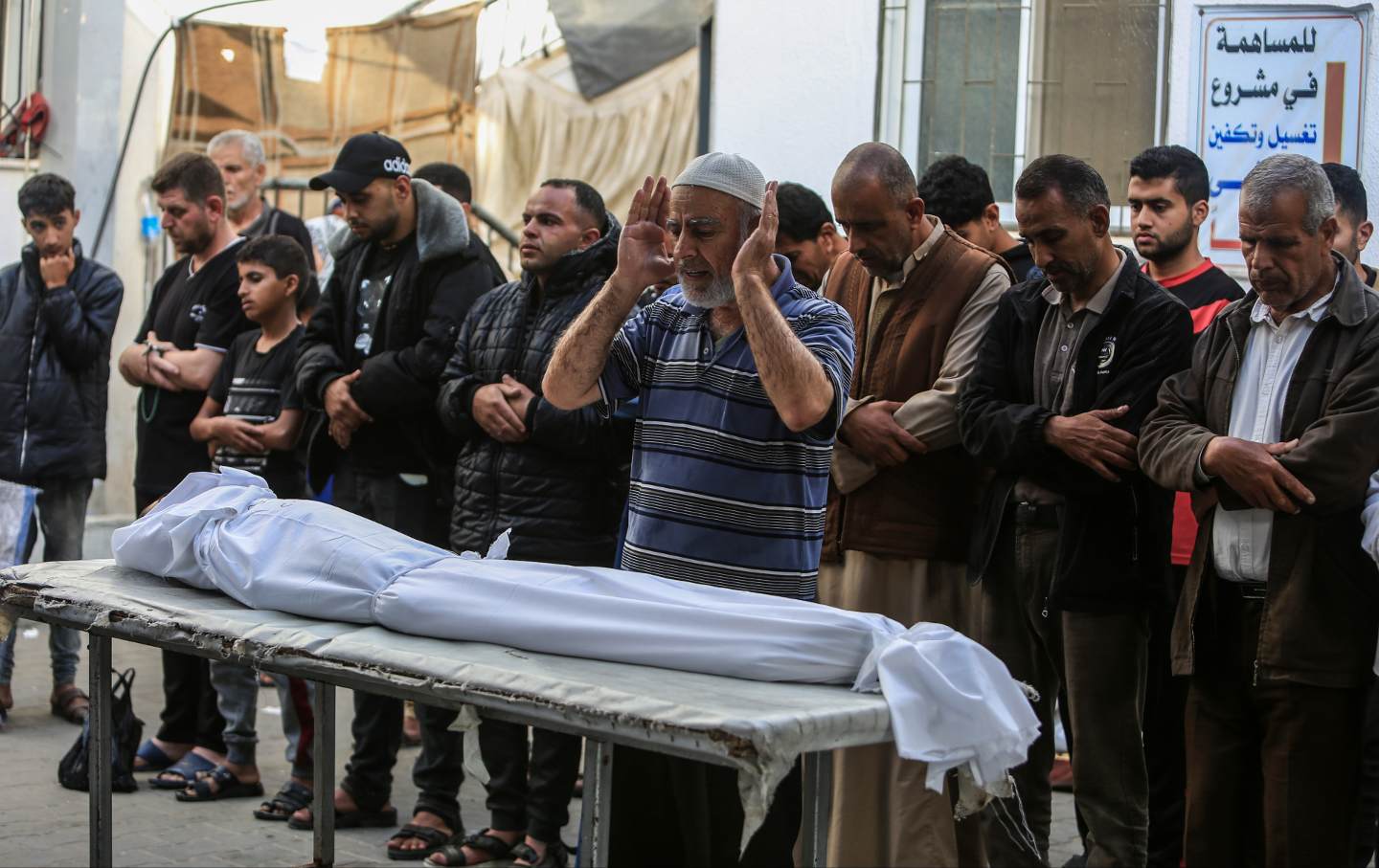 Relatives of Palestinians who lost their lives as a result of Israeli air strike mourn as they take the dead bodies from the morgue of El-Najar Hospital to be buried in Rafah, Gaza on April 21, 2024.