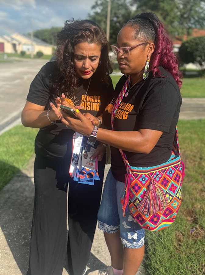 Jessy Correa (left) and Ronda Wallace canvass for Florida Rising in Orlando in support of Amendment 4.