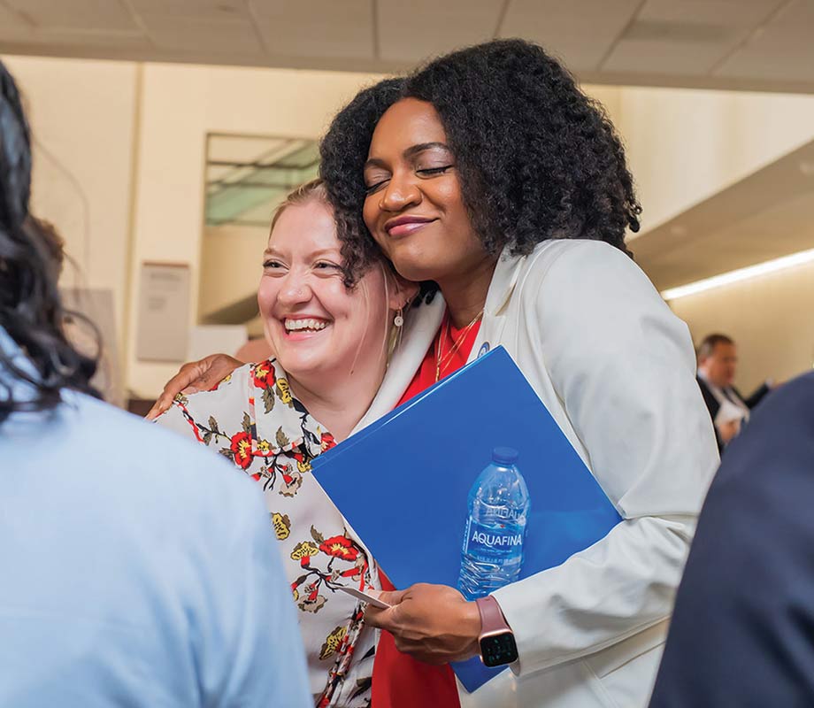 Sarah Henry, left, is a former clinic escort who is running for state House of Representatives, pictured with Florida House of Representatives minority leader Fentrice Driskell.