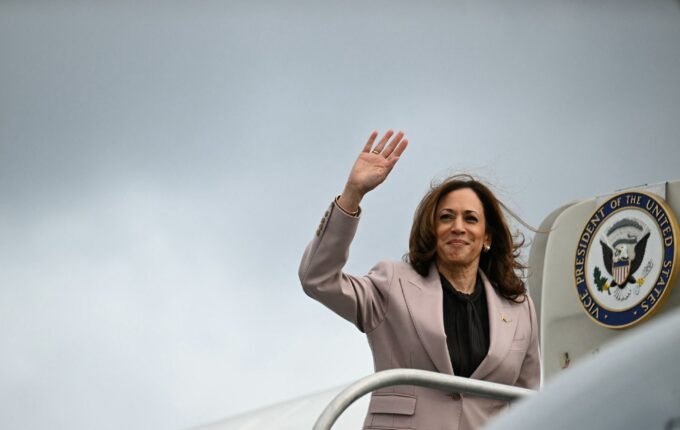 Democratic presidential candidate Vice President Kamala Harris waves as she boards Air Force Two at Philadelphia International Airport in Philadelphia, Pennsylvania, on September 17, 2024, as she returns to Washington, DC.