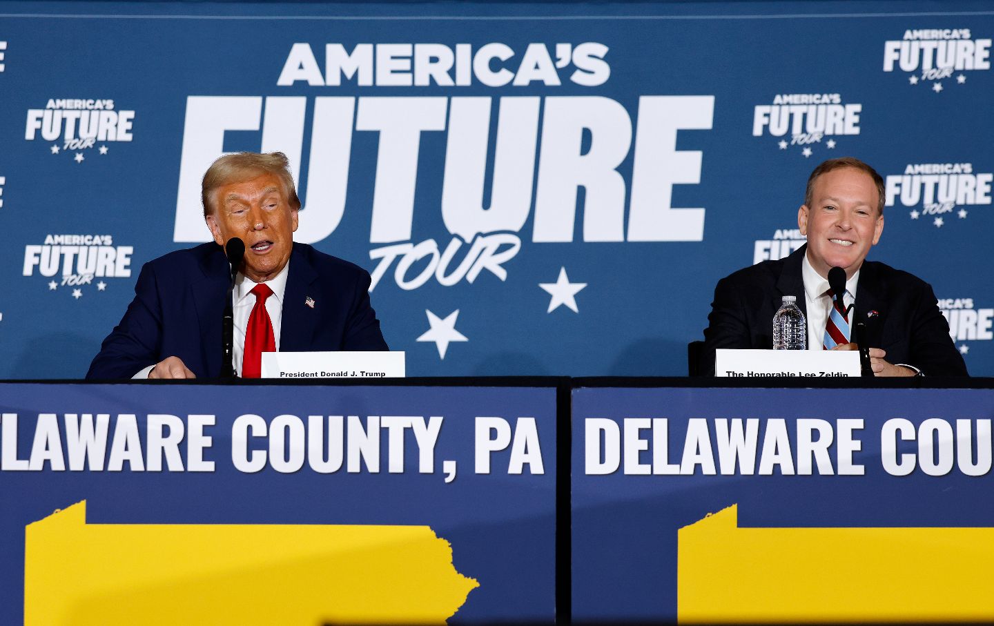 Donald Trump participates in a roundtable discussion with former Republican representative from New York Lee Zeldin.