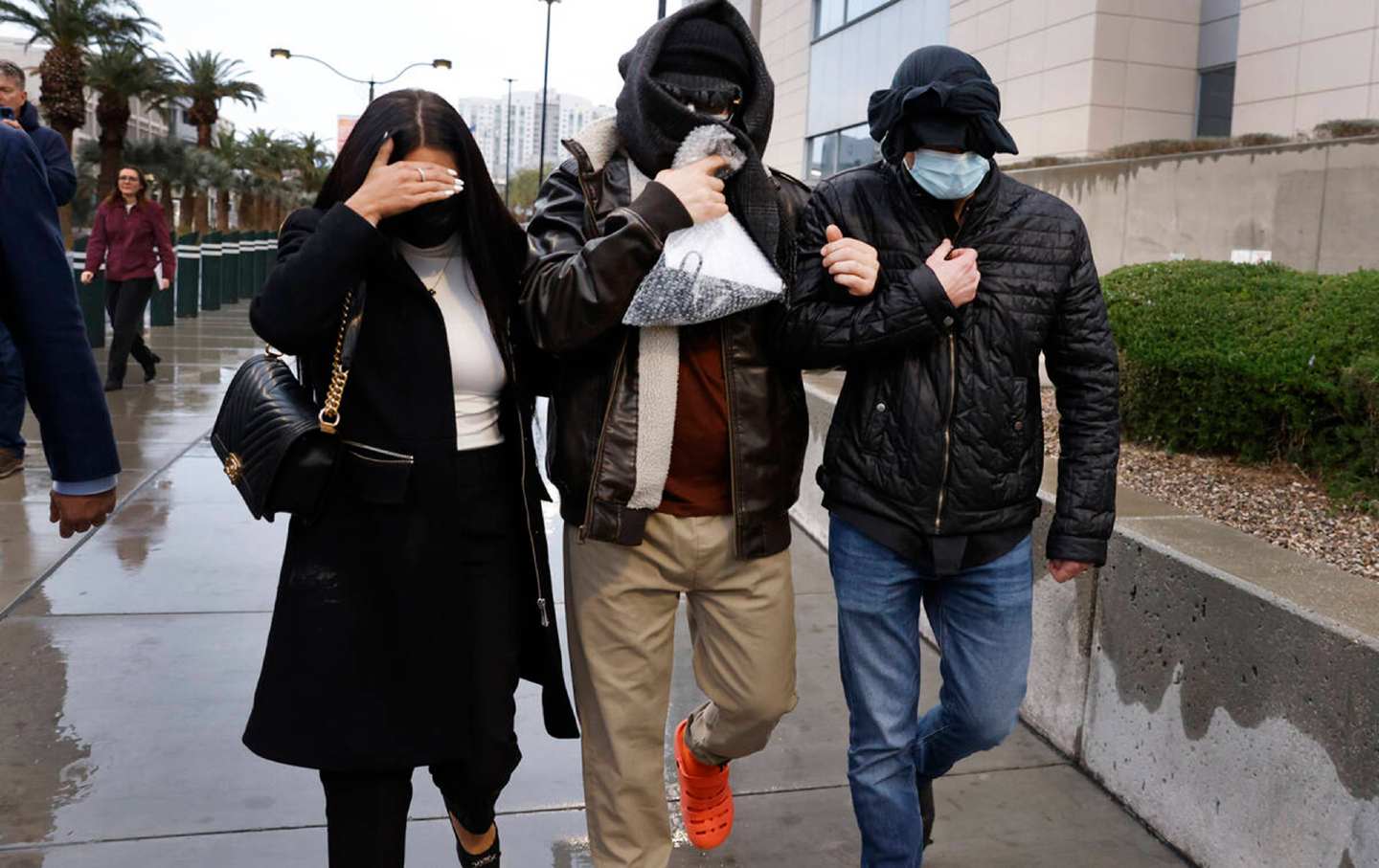 Alexander Smirnov (center) outside a Las Vegas federal courthouse last year.