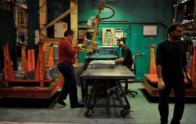Workers at the Mondragon Cooperative's Fagor factory, in Arrasate, Spain.