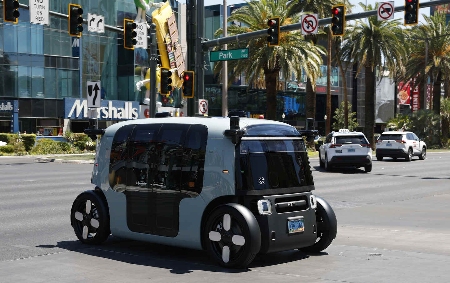 An Amazon Zoox driverless robotaxi drives on the Las Vegas Strip on August 7, 2025.