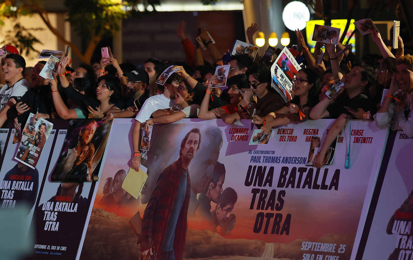 Fans cheer at an event for the movie 