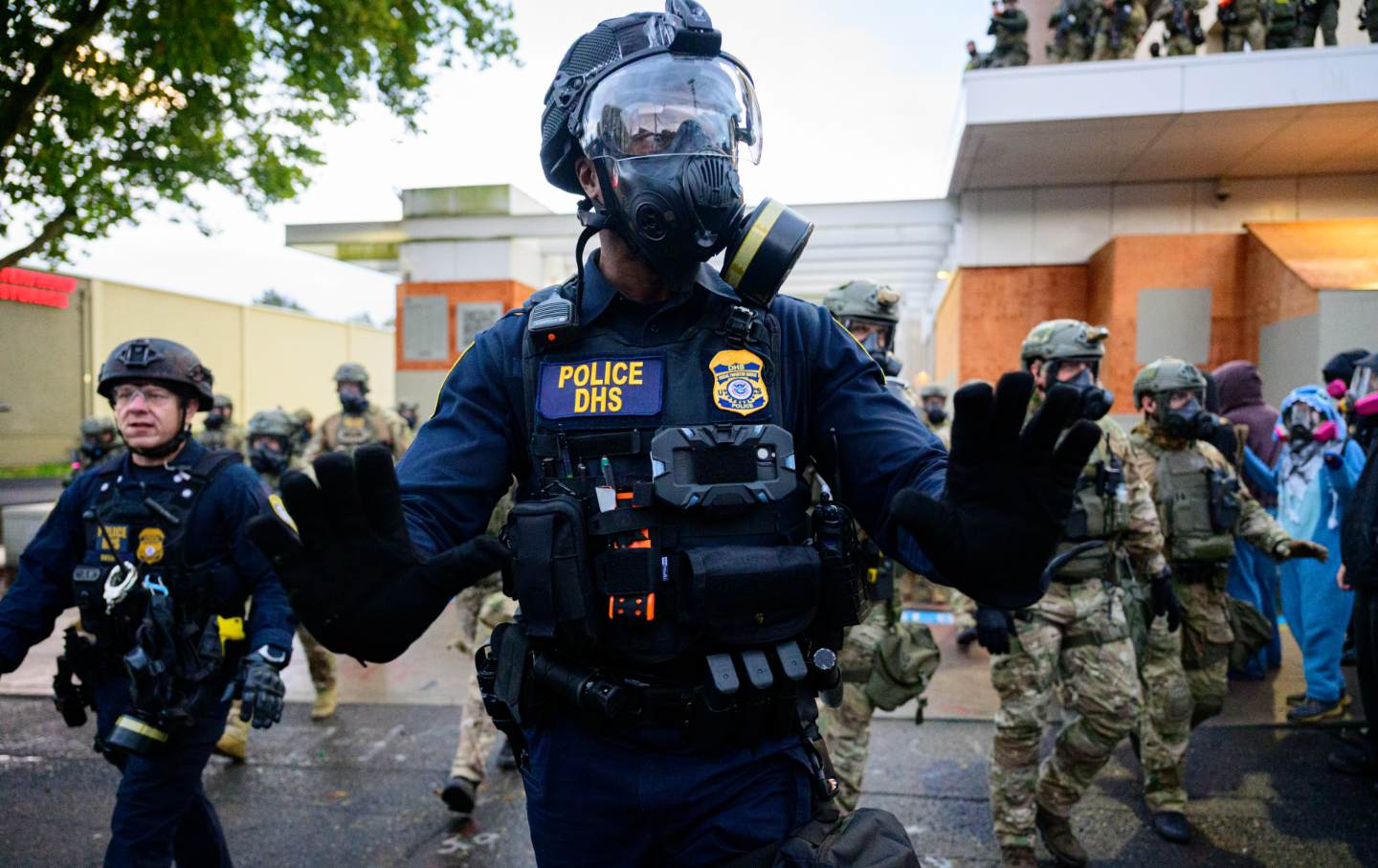 Federal agents clash with anti-ICE protesters at the U.S. Immigration and Customs Enforcement building on October 12, 2025, in Portland, Oregon.