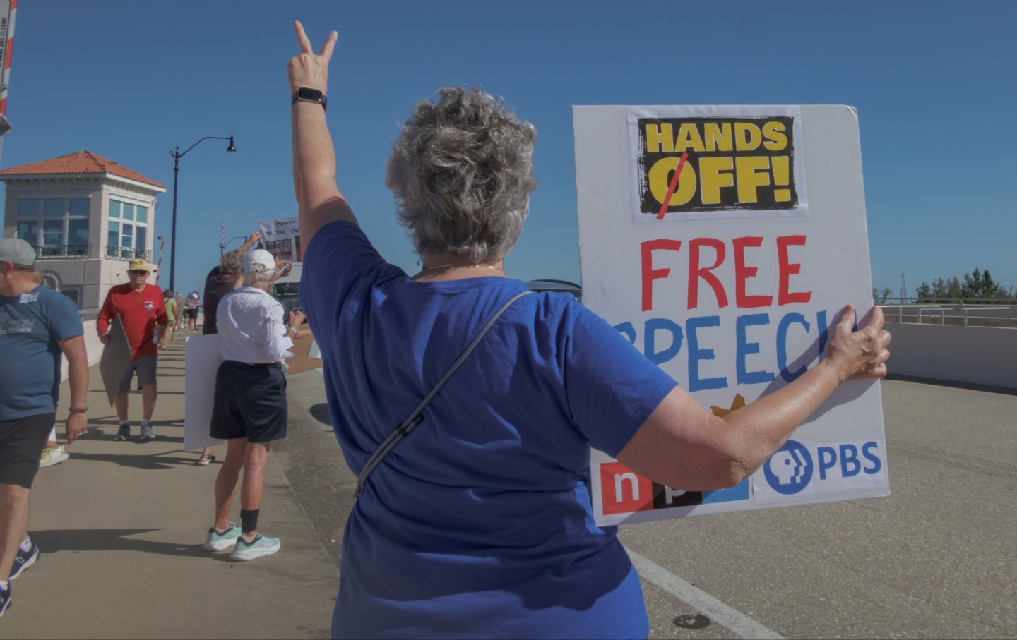 A protester at the No Kings rally in Venice, Florida, on October 18, 2025.