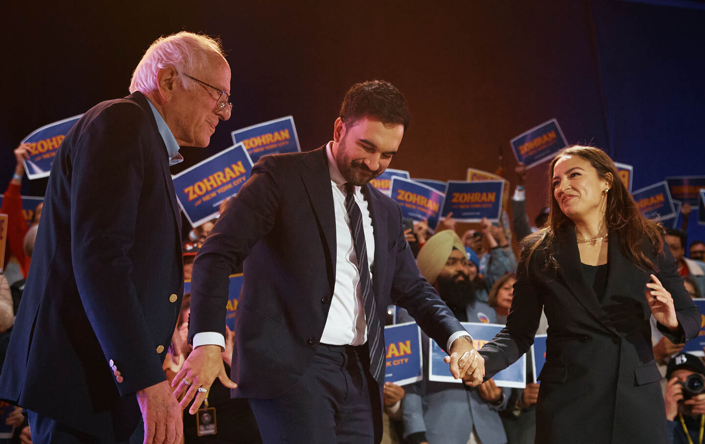 Mayoral Candidate Zohran Mamdani (C) with Senator Bernie Sanders (I-VT), left, and Representative Alexandria Ocasio-Cortez (D-NY), right, during an election rally on October 26, 2025, in New York City.