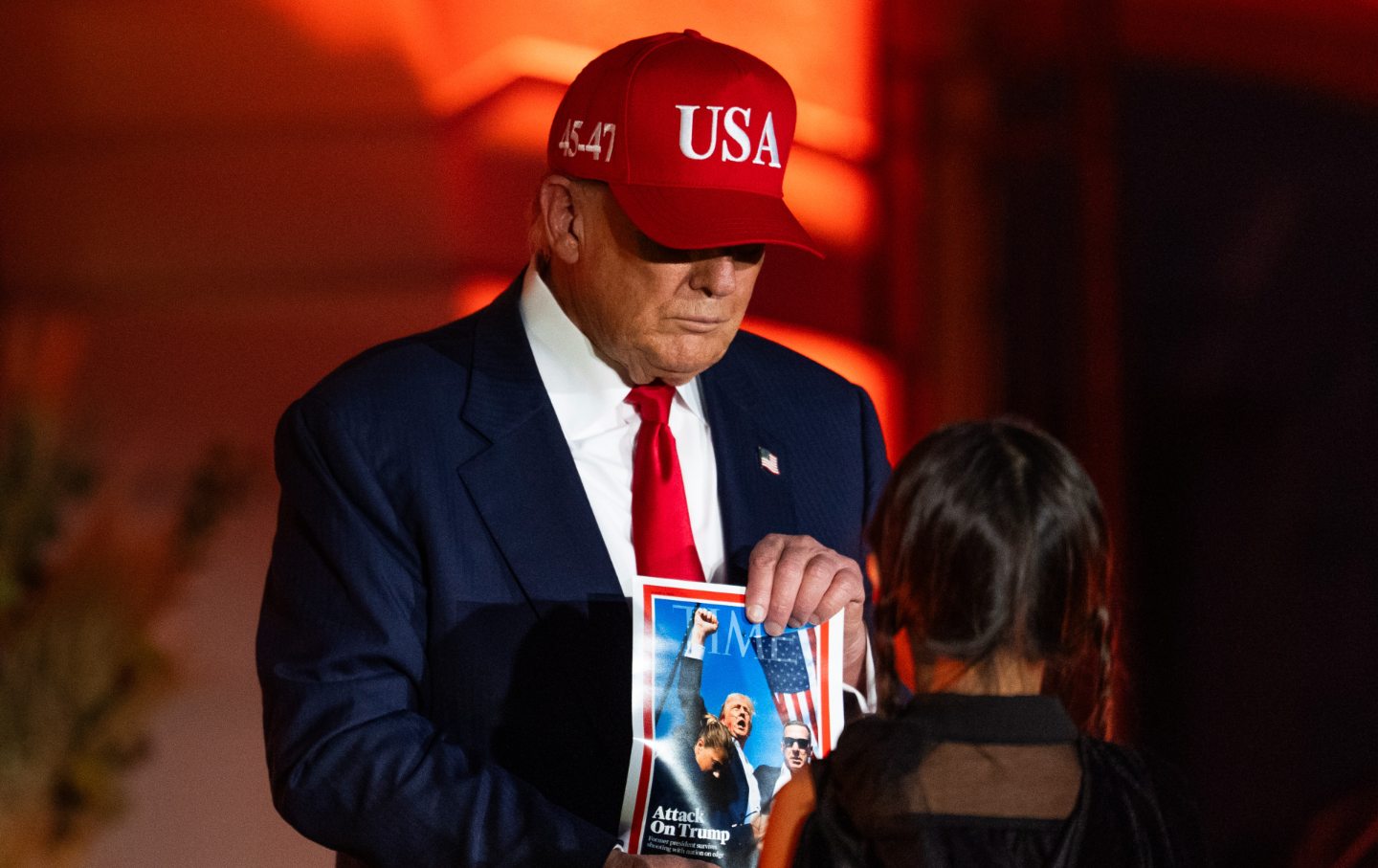 Donald Trump greets a child, dressed up in costume, during a Halloween event on the South Lawn of the White House in Washington, DC, US, on Thursday, Oct. 30, 2025.