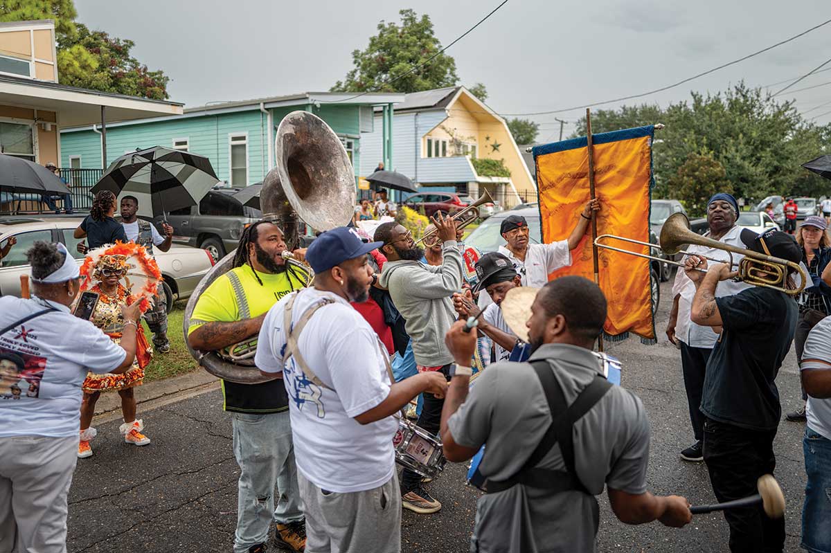 A brass band plays in the Lower Ninth Ward during a parade on the anniversary of Katrina.