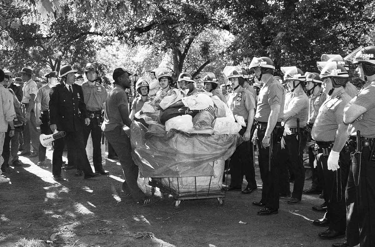 Police evict a homeless man from Tompkins Square Park in 1991.