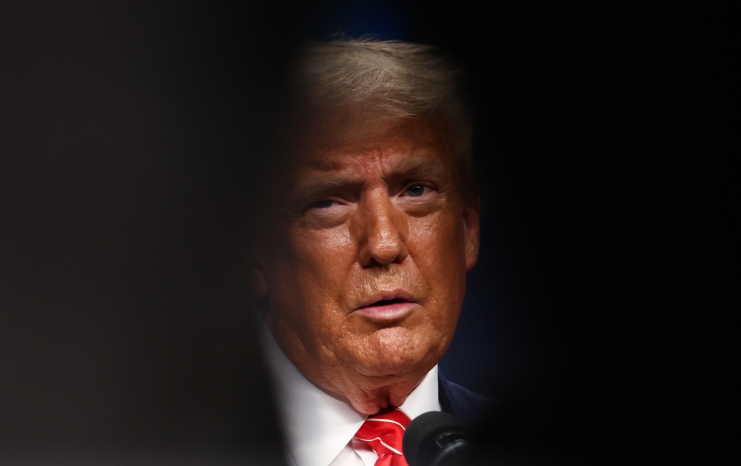 Trump speaks at a NATO Summit