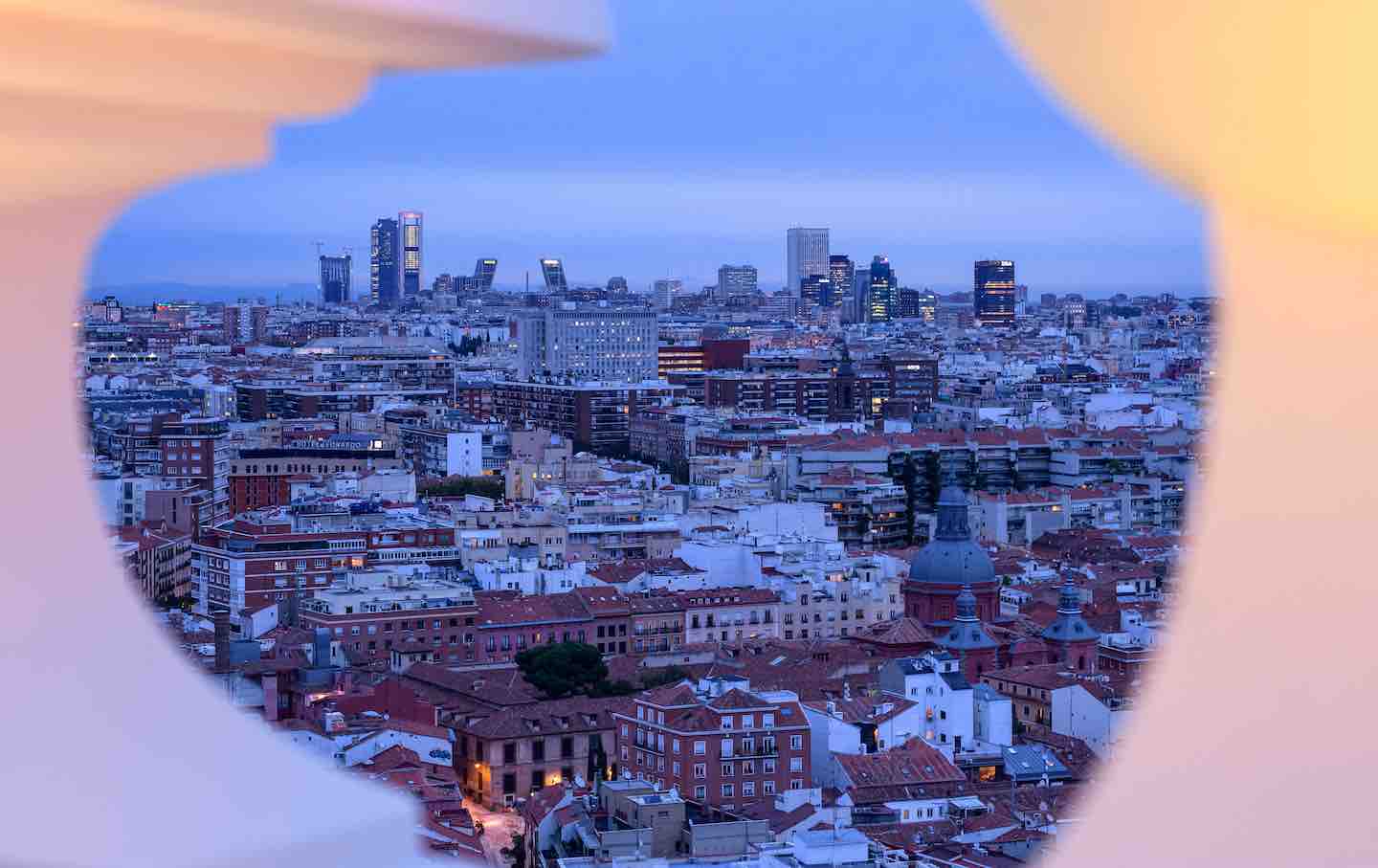 The skyline of Madrid seen during twilight from the roof top of the Riu Plaza Madrid, 2019.