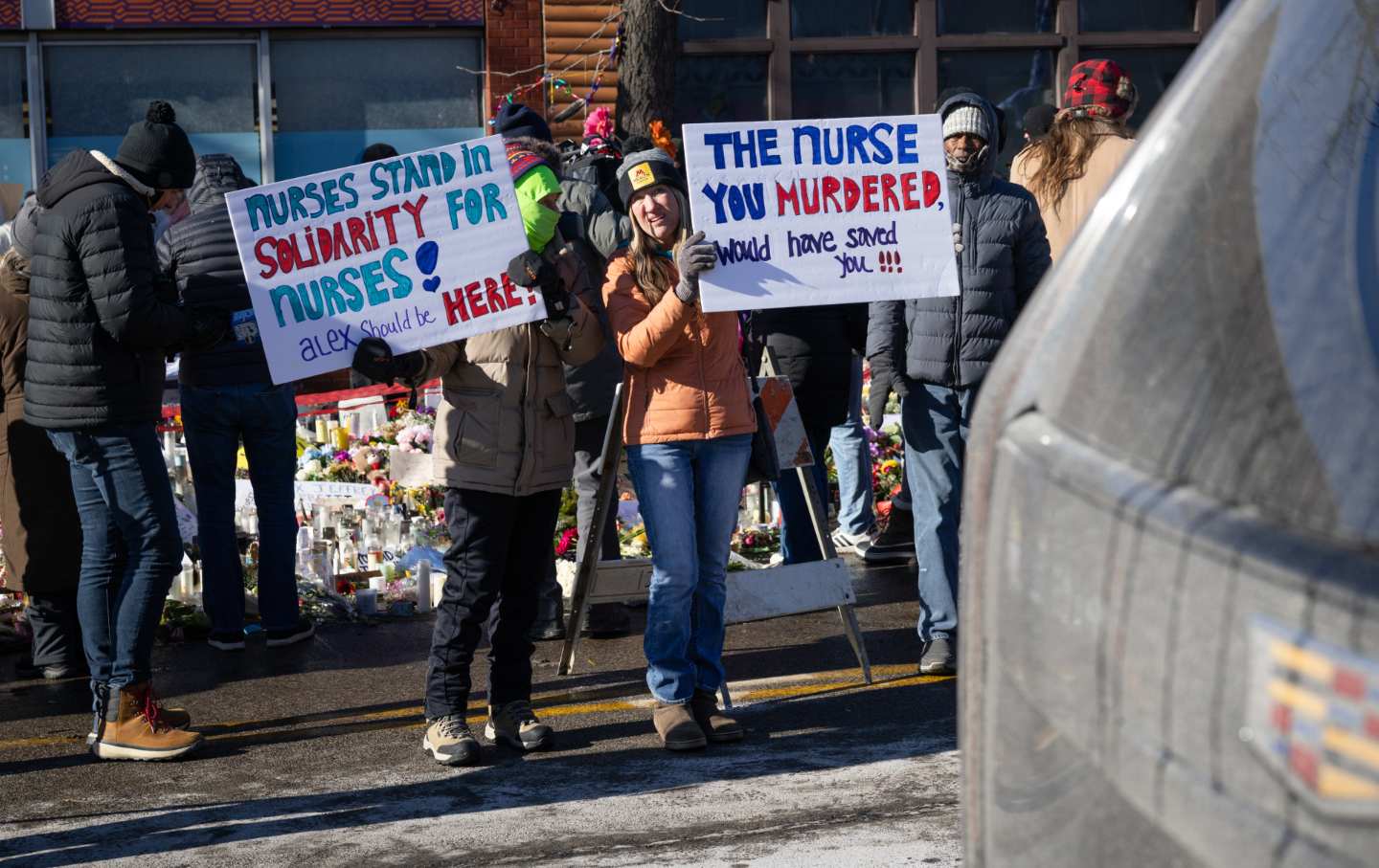 Protesters at a memorial to Alex Pretti on January 27, 2026, in Minneapolis.