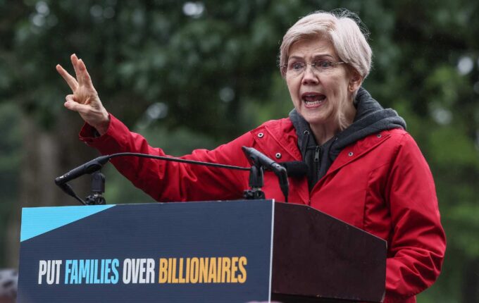 Senator Elizabeth Warren (D-MA) addresses a rally against the Republican spending bill in May.