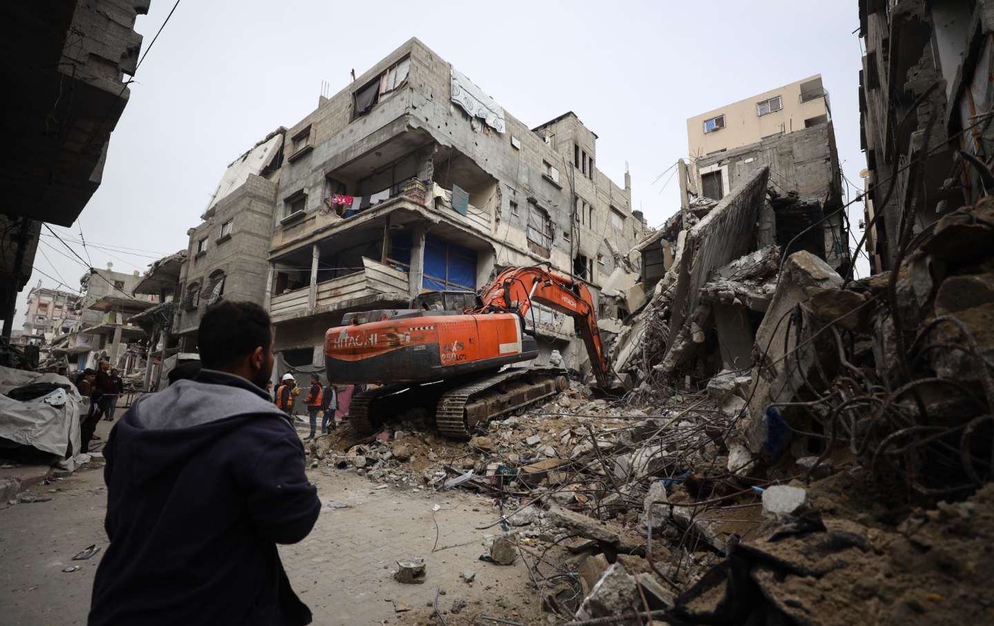 Civil defense teams carry out operations to recover the bodies of five members of the Abu Nida family who were trapped under the rubble of a building destroyed in Israeli attacks on the Sheikh Radwan neighborhood in Gaza Strip on February 0, 2026.