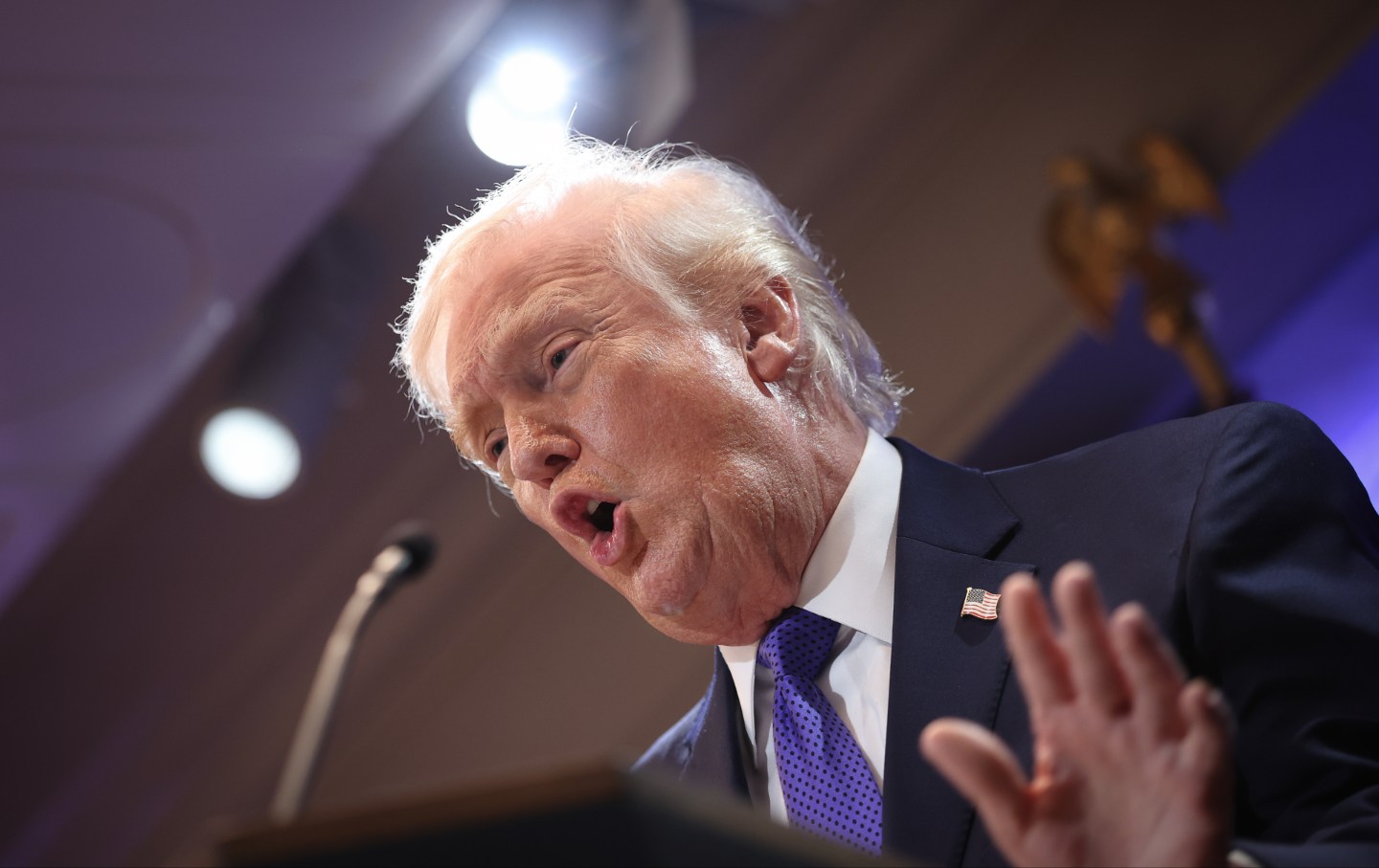 Donald Trump answers questions during a press briefing held at the White House February 20, 2026