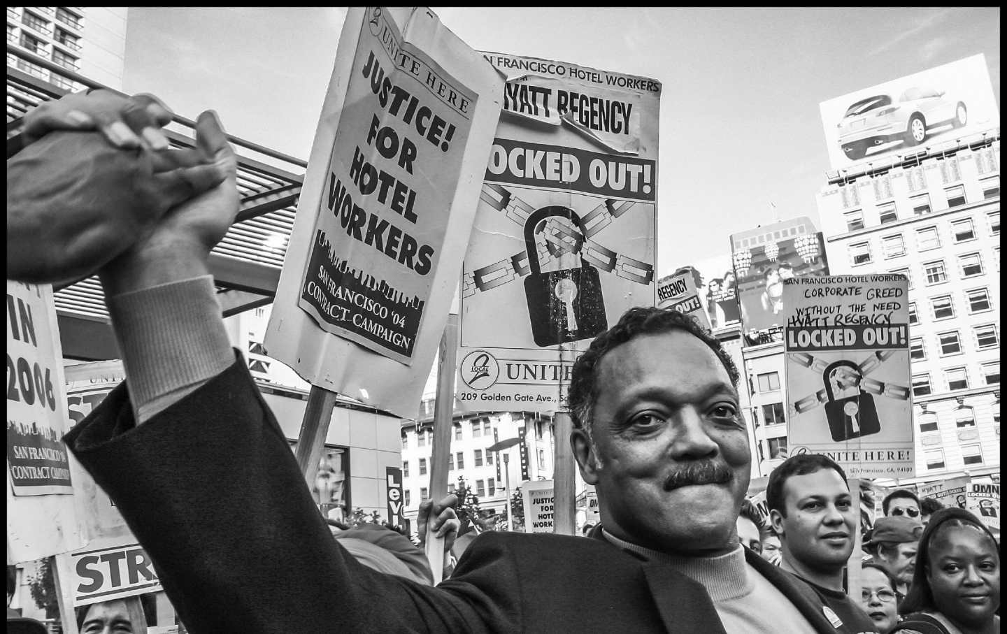 Jesse Jackson marching with striking San Francisco hotel workers in 2004.