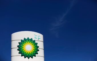 A BP company logo sits on display on the forecourt of a gas station.