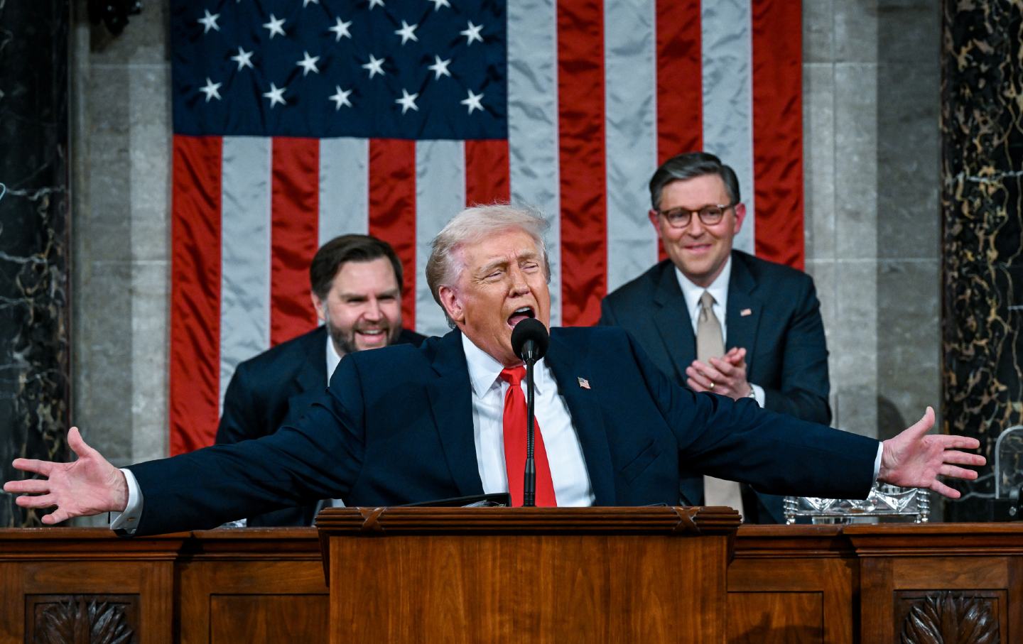 President Donald Trump flanked by Vice President JD Vance, from left and House Speaker Mike Johnson during the 2026 State of the Union address.