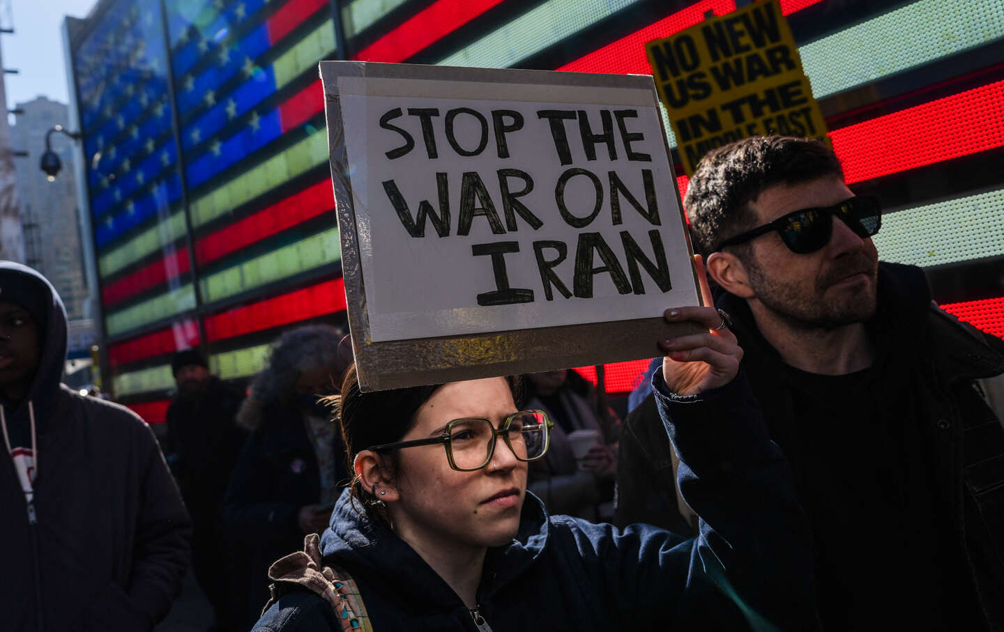 Protesters gather in Times Square as the nation reacts to 