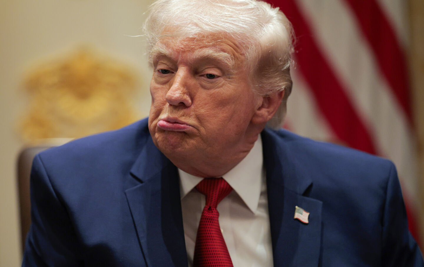 President Donald Trump reacts during a Cabinet meeting.