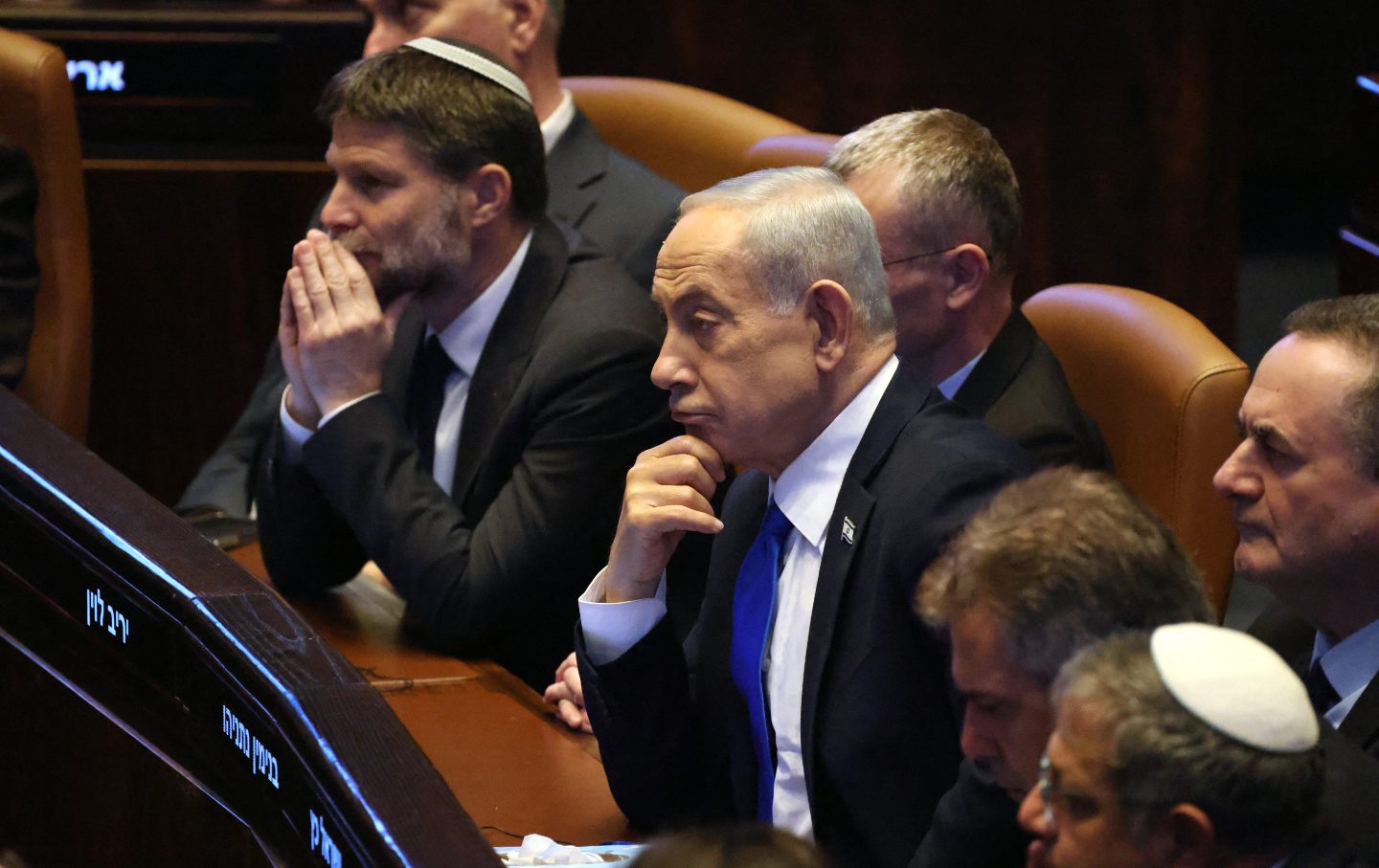 Israeli Prime Minister Benjamin Netanyahu and Finance Minister Bezalel Smotrich listen to a speech given by Indian Prime Minister Narendra Modi at the Knesset, in Jerusalem, on February 25, 2026.