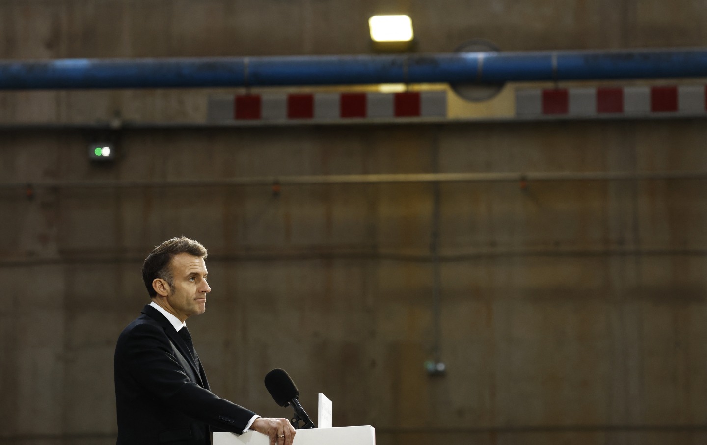 France's President Emmanuel Macron delivers a speech next to the nuclear-powered ballistic missile submarine "Le Temeraire" - S617 during his visit to the Nuclear Submarine Navy Base of Ile Longue in Crozon, northwestern France on March 2, 2026.