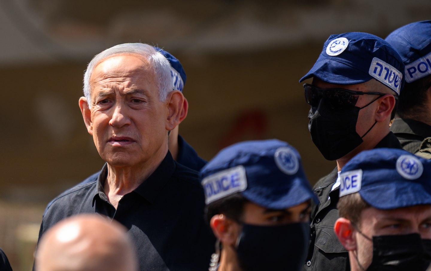 Israeli Prime Minister Benjamin Netanyahu reacts while visiting the area destroyed by an Iranian ballistic missile in Dimona, Israel, on March 22, 2026.