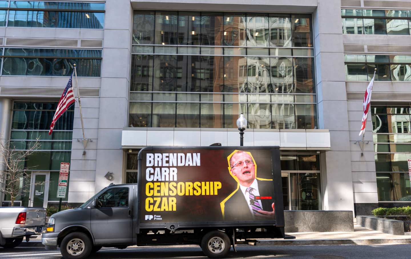 A mobile billboard assails the censorship regime of FCC Chair Brendan Carr outside the agency's headquarters in Washington, DC.
