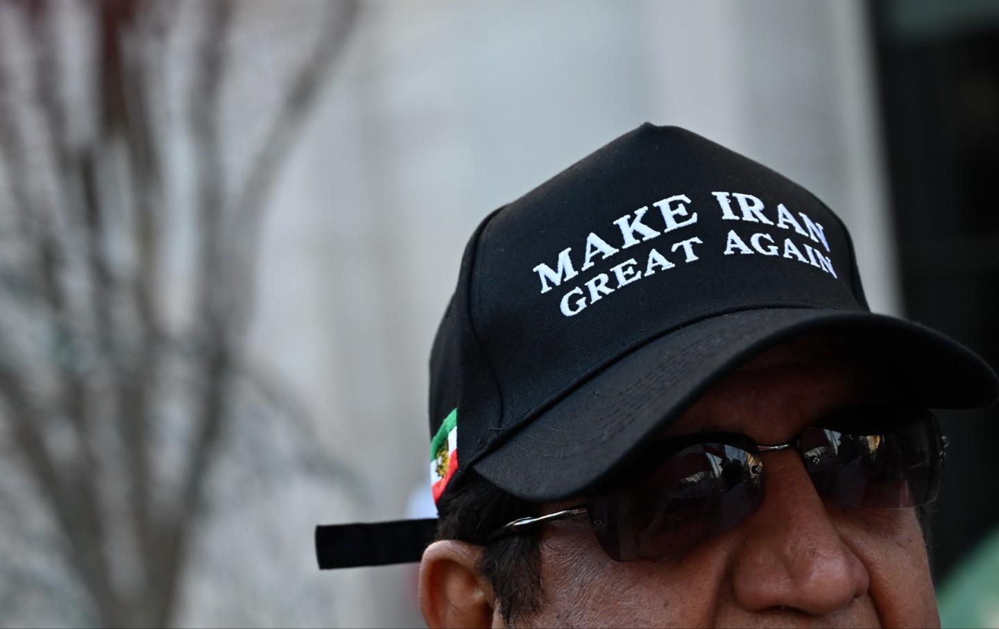 A demonstrator from the Iranian diaspora rallies near the White House in Washington, DC, US, on Saturday, March 7, 2026.