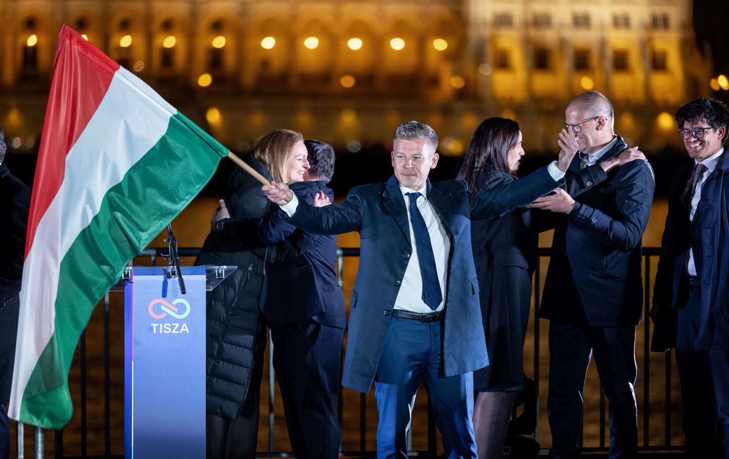 Peter Magyar (C), lead candidate of the Tisza party, speaks to supporters after polling stations closed during Hungarian parliamentary elections on April 12, 2026, in Budapest, Hungary.
