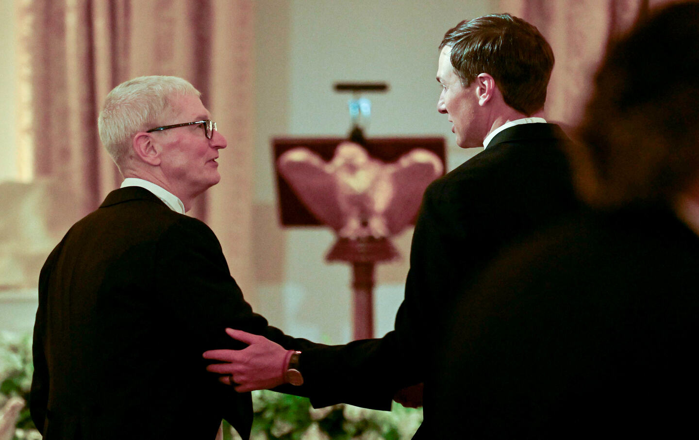 Tim Cook, chief executive officer of Apple Inc., and Jared Kushner, founder and chief executive of Affinity Partners LLC, during a state dinner with Queen Camilla and King Charles III in the East Room of the White House in Washington, DC.