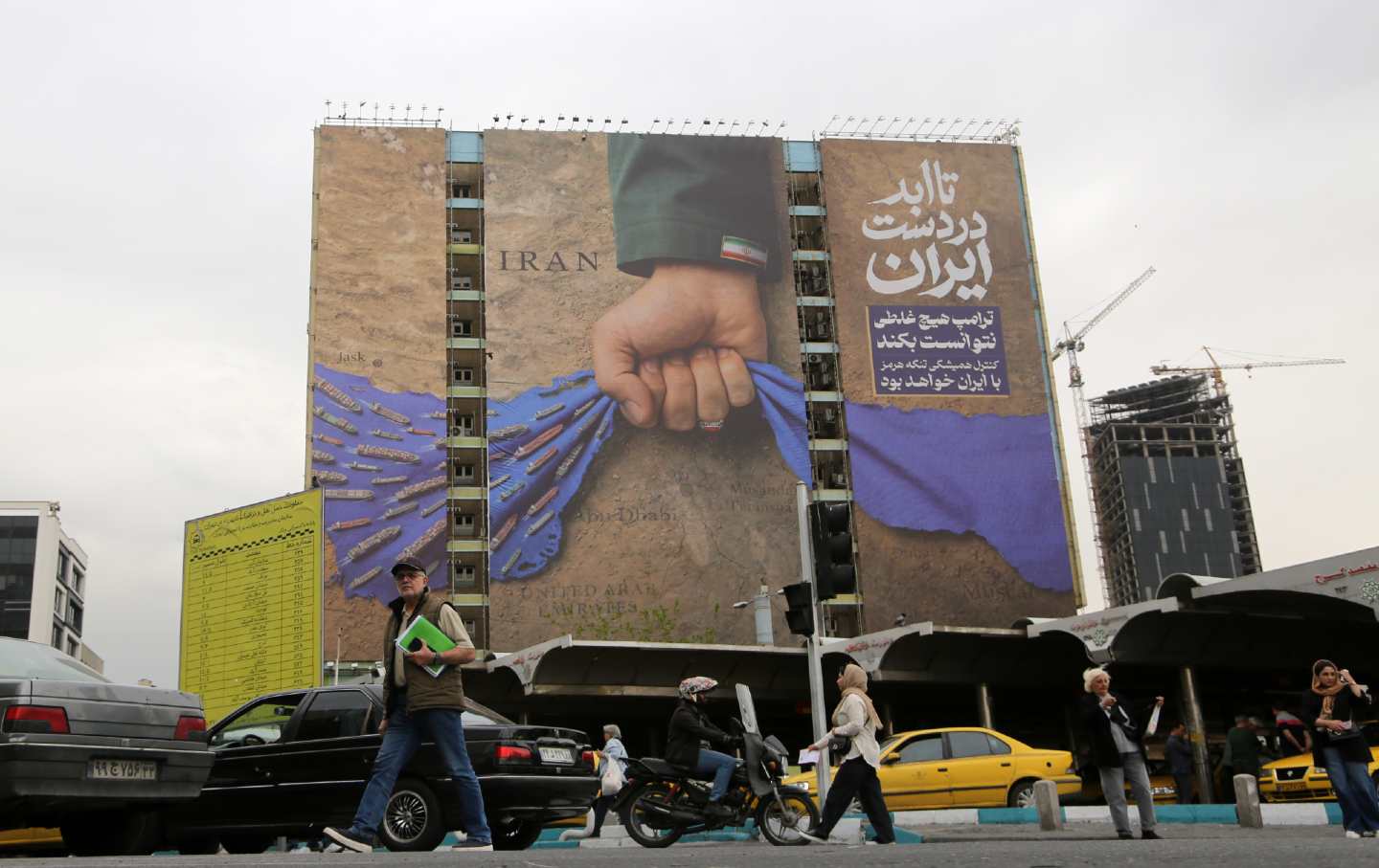 A billboard in Tehran asserts that despite the threats of President Donald Trump, Iran will retain control over the Strait of Hormuz.