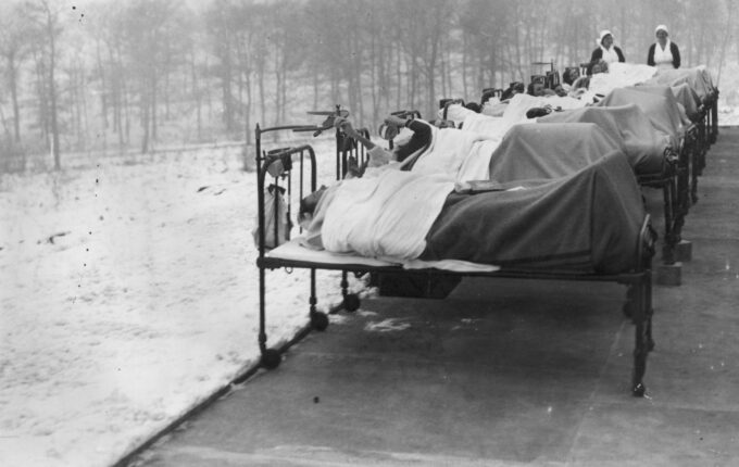 Patients crippled by tuberculosis are treated outdoors in the snow at the Harlow Wood Orthopaedic Hospital in Nottinghamshire, on January 24, 1933. Whatever the weather, they spent their days lying on iron bedsteads in the open air, as a “curative” measure.