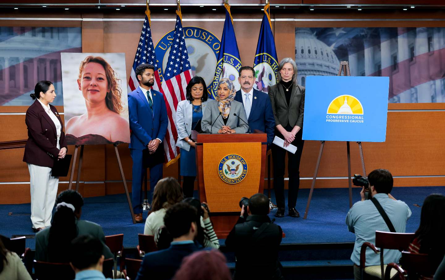 Members of the Congressional Progressive Caucus—including Representatives Ilhan Omar (D-MN), Delia Ramirez (D-IL), Maxwell Frost (D-FL), Pramila Jayapal (D-WA), Jesus “Chuy” Garcia (D-IL), and Maxine Dexter (D-OR)—address the press discussing DHS funding and the death of Renée Good in Minneapolis, at the US Capitol on January 13, 2026, in Washington, DC.