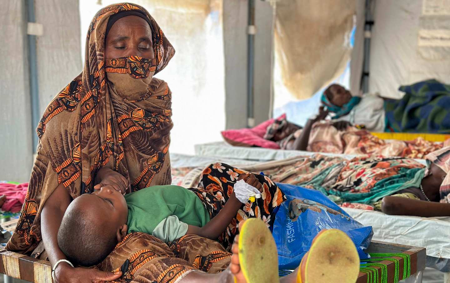 Cholera infected patients receive treatment in the cholera isolation centre at the refugee camps of western Sudan, in Tawila city in Darfur.