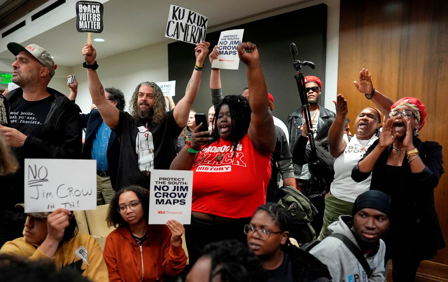 Protesters yell in a Senate committee meeting during a special session of the state legislature to redraw U.S. Congressional voting maps Wednesday, May 6, 2026, in Nashville, Tenn