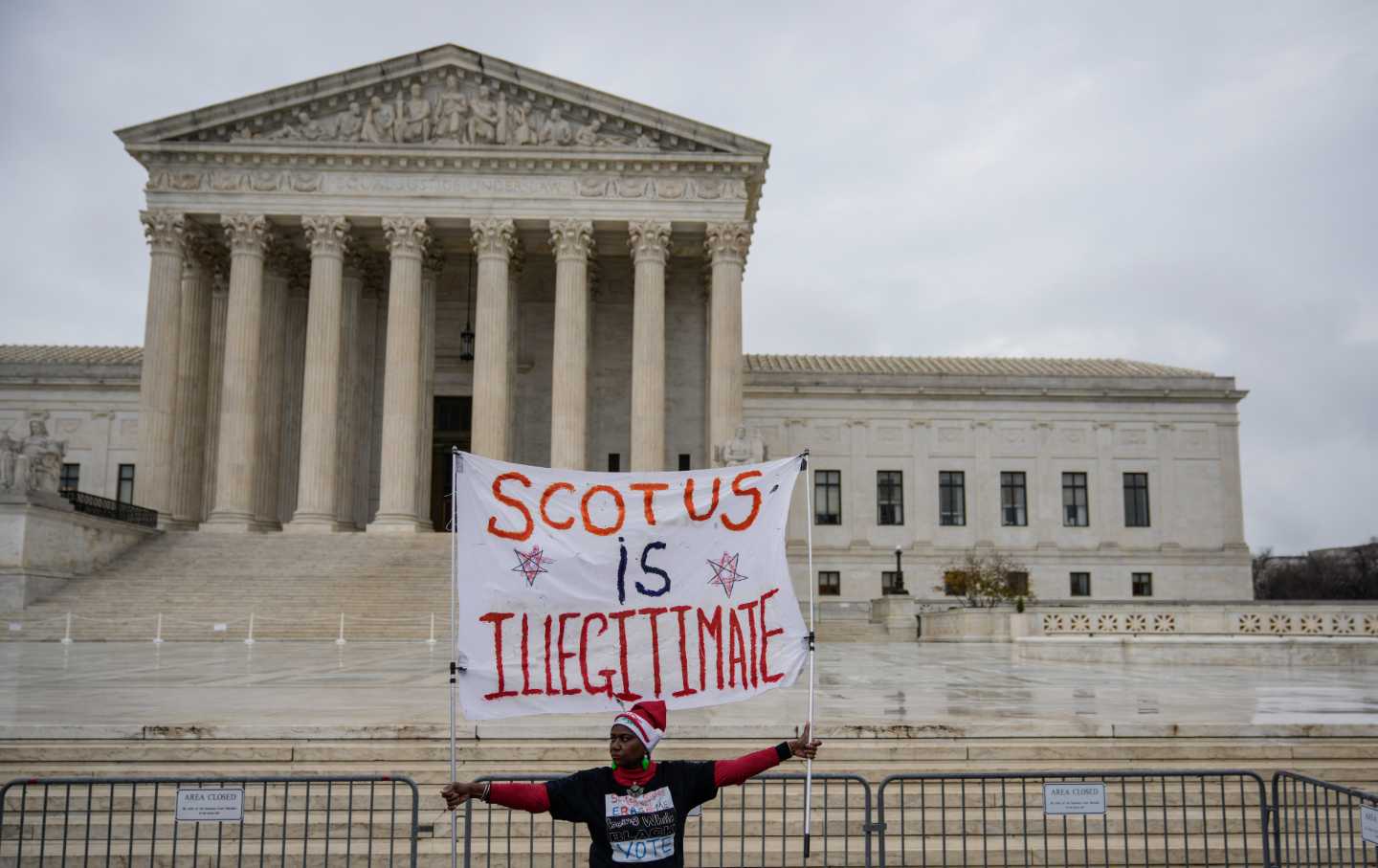 Nadine Seiler attends a rally for voting rights in front of the Supreme Court Building in Washington, DC, on December 7, 2022.