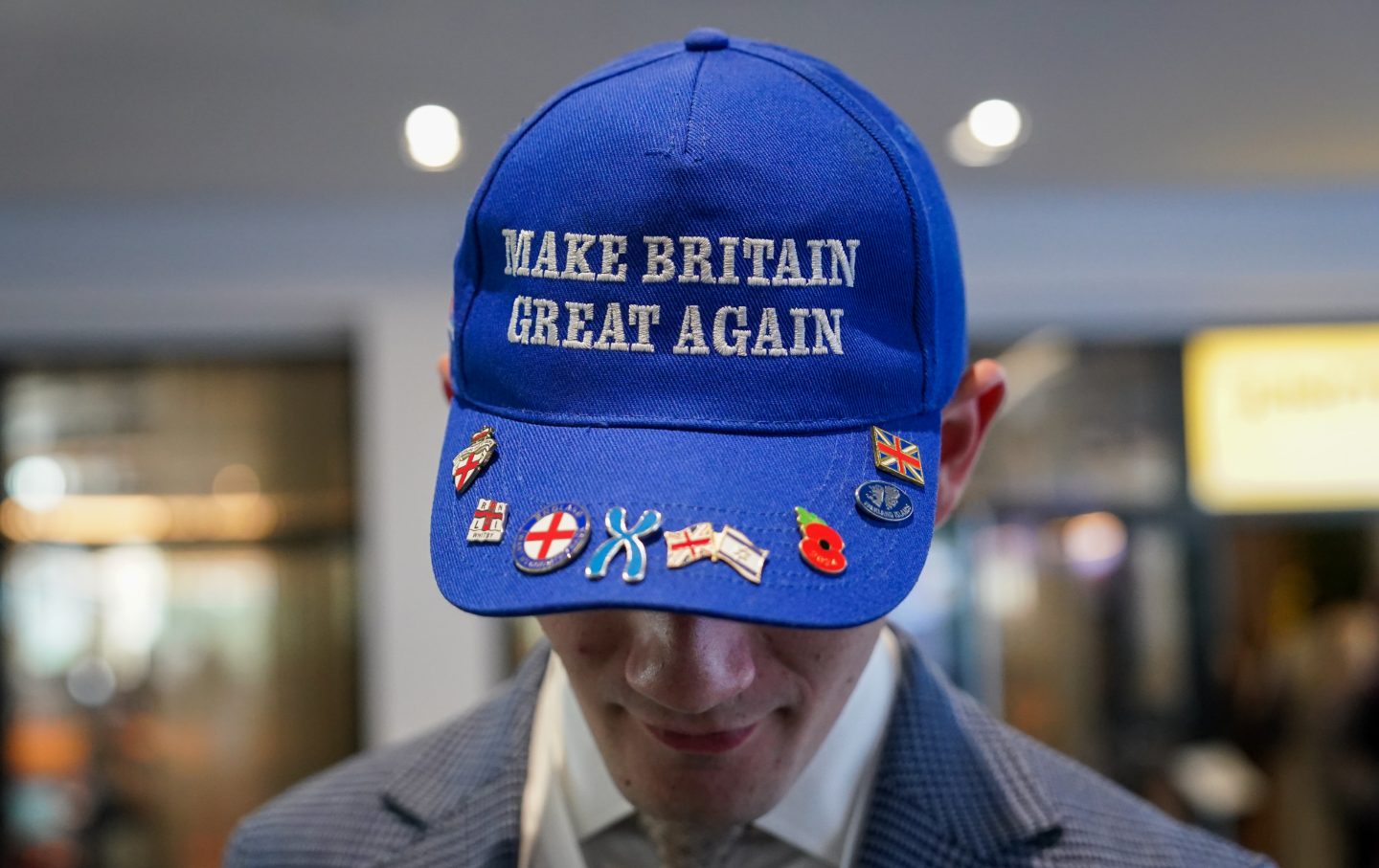 A delegate wears a Make Britain Great Again baseball cap on day two of the Conservative party conference at Manchester Central Convention Complex on October 06, 2025 in Manchester, England.