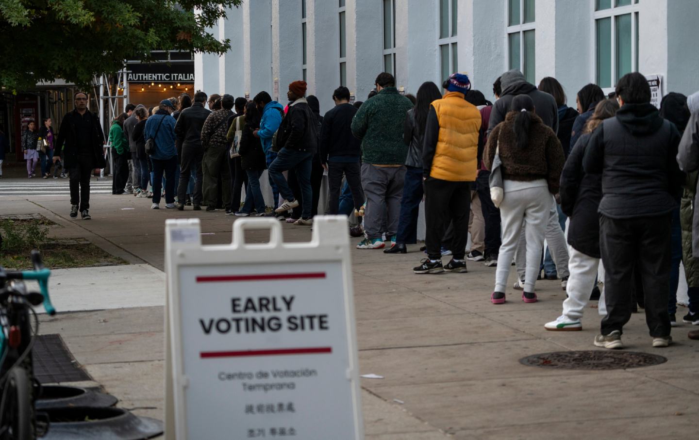 People wait in line at a polling station in Queens. New York, November 2, 2025.