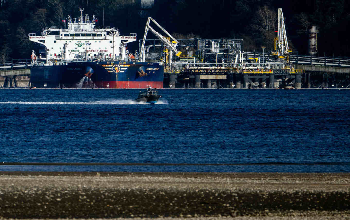 An oil tanker is loaded at the Westridge Marine Terminal at the end point of the Trans Mountain Pipeline System in Burnaby, British Columbia, Canada, on Tuesday, March 24, 2026.