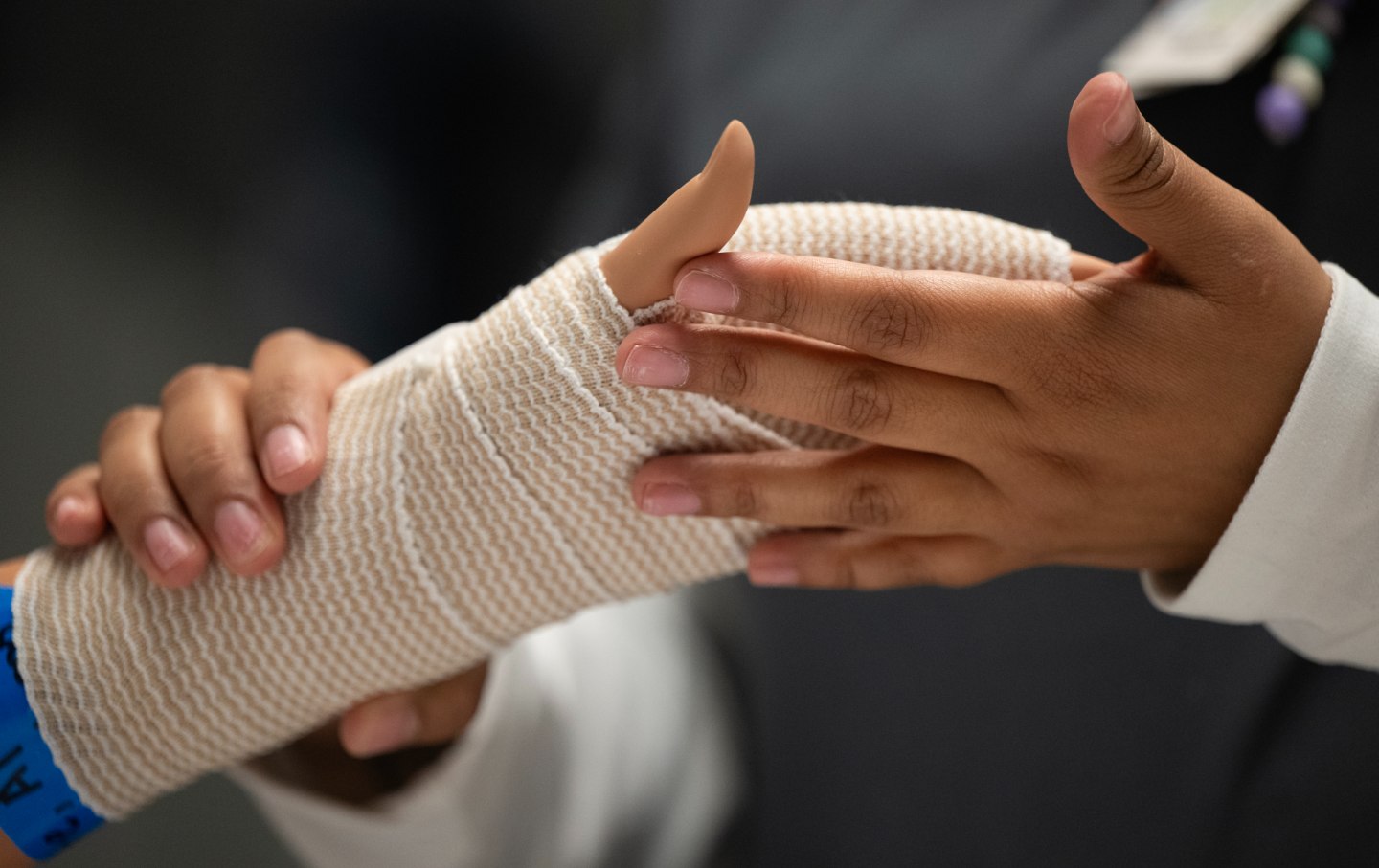 Red Rocks Community College student Ariana Lazo practices wrapping the wrist of a training manikin during a nursing skills lab class on Thursday, April 9, 2026, at the school's Arvada Health Sciences Campus in Arvada, Colo.