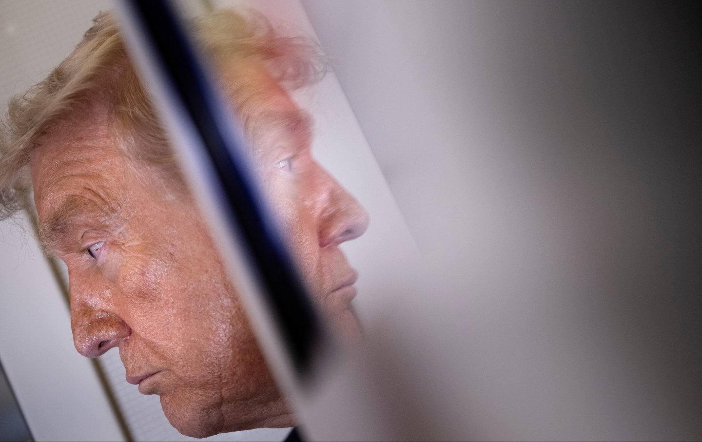 Donald Trump speaks to reporters aboard Air Force One after his departure from Beijing Capital Airport on May 15, 2026.