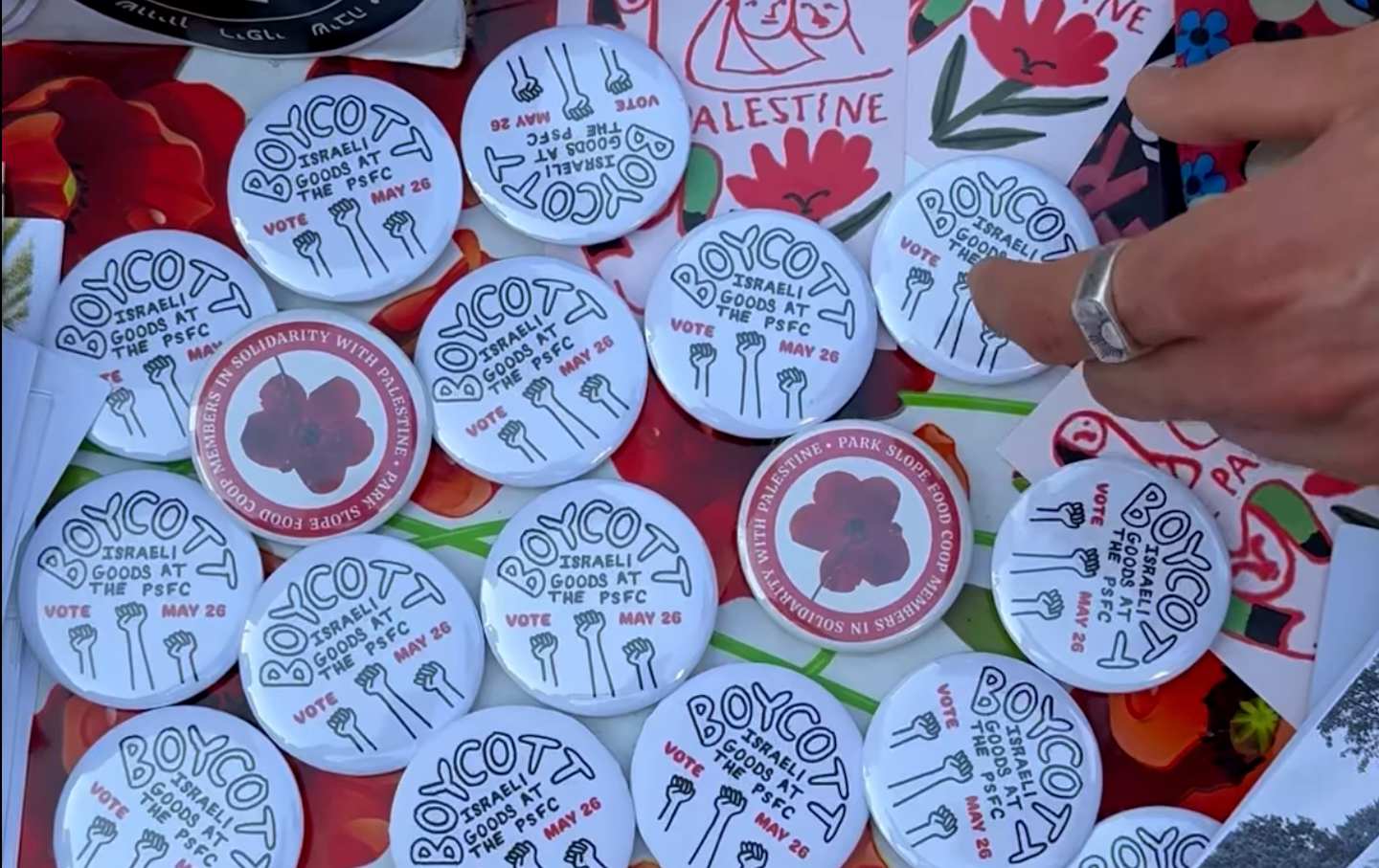 A display of buttons in support of boycotting Israeli goods at the Park Slope Food Coop.