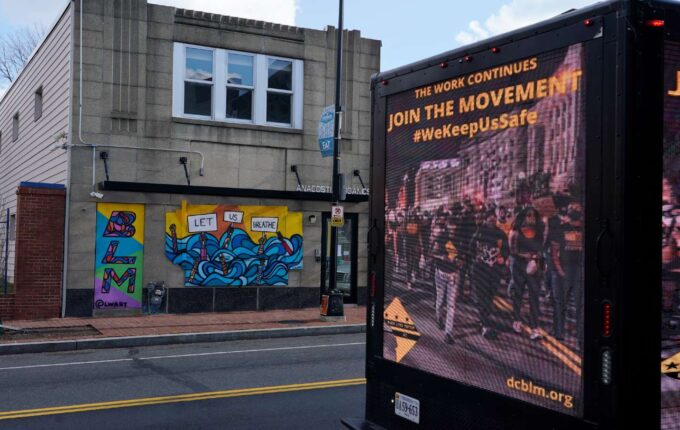 A mobile billboard in Washington, DC, sponsored by The Frontline, a coalition including the Working Families Party, the Movement for Black Lives, Rising Majority, and United We Dream