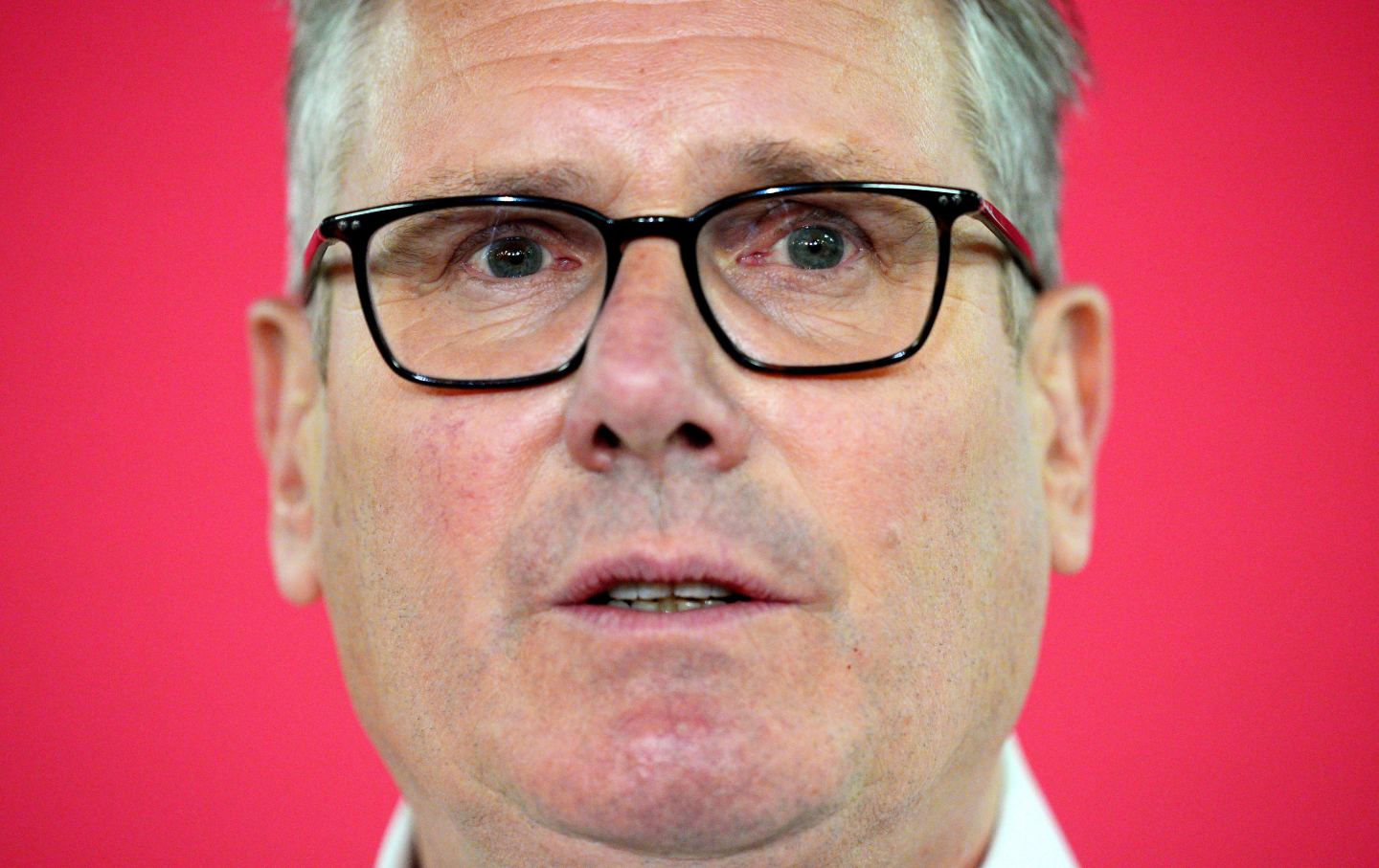 Prime Minister Keir Starmer musters the courage to deliver a speech after his political party, Labour, lost nearly 1,500 seats in local elections across the United Kingdom, at Coin Street Community Centre in London, England, on May 11, 2026.