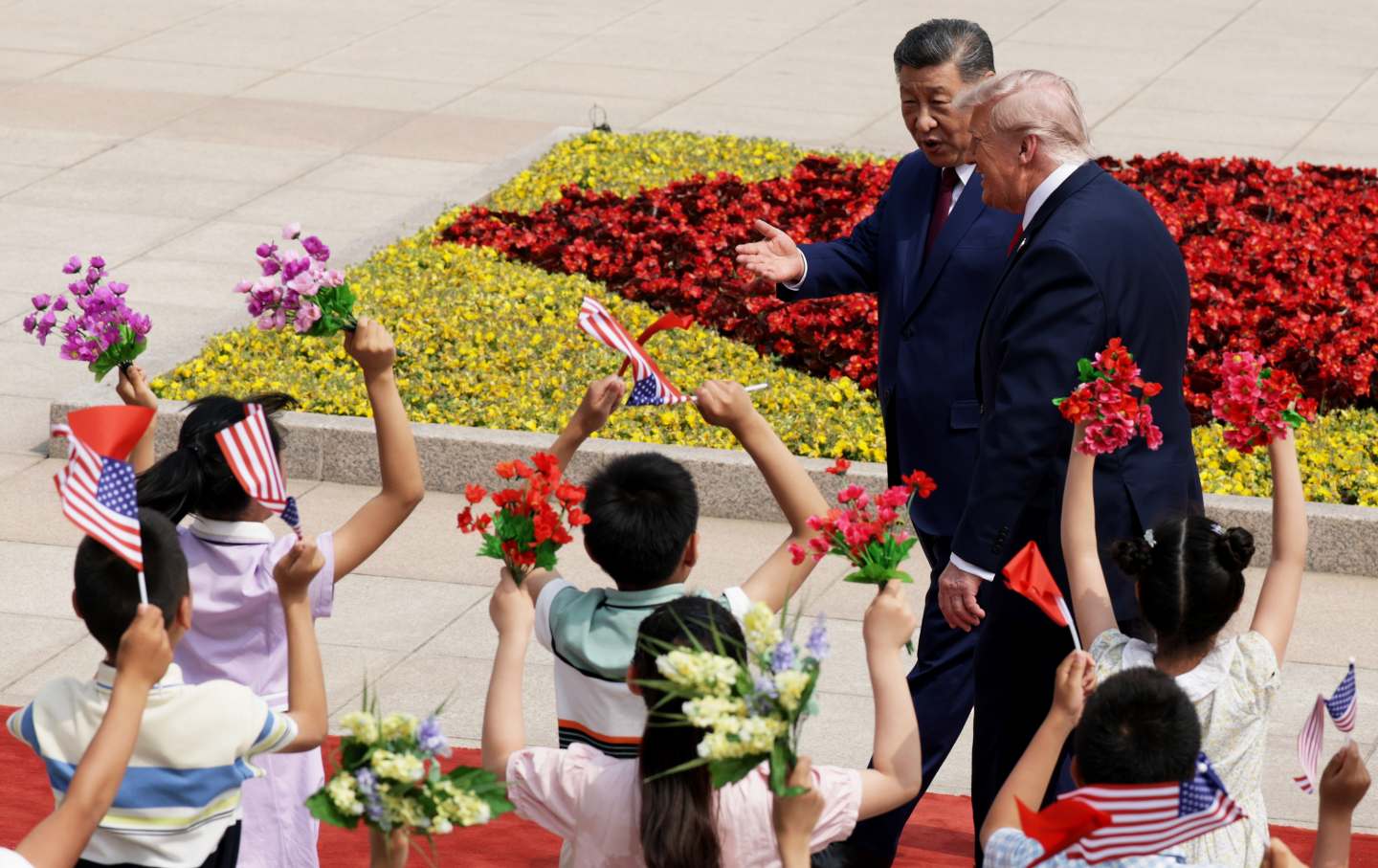 US President Donald Trump and Chinese President Xi Jinping attend a welcome ceremony at the Great Hall of the People in Beijing, China, on May 14, 2026.